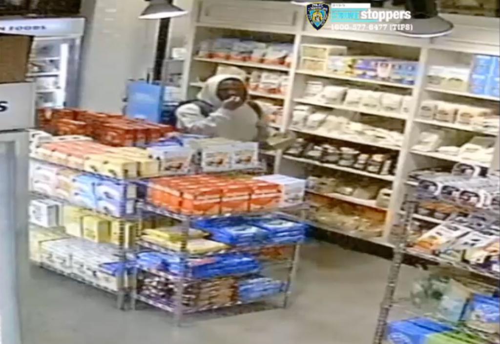 A still photo of the suspect at Hudson Market.