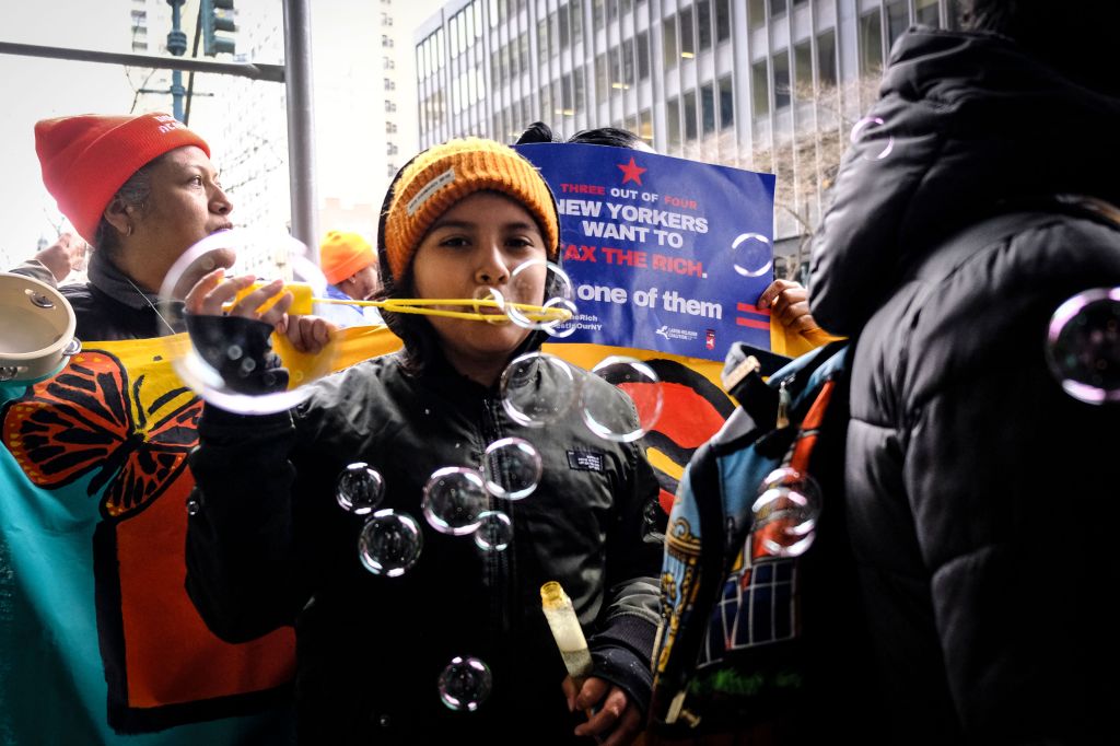 New York City students and teachers marched to Gov. Kathy Hochul's office to demand that New York invests in affordable housing, receive a high-quality public education, access comprehensive healthcare and universal childcare, and live in well-resourced communities on a livable planet. 