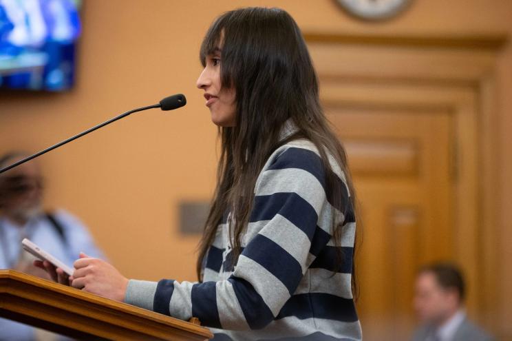 Chloe Cole speaking at the Kansas Statehouse about her experience detransitioning on Feb. 29, 2024.