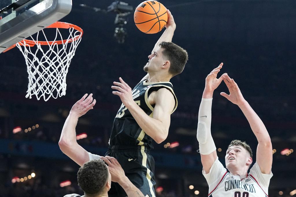 Camden Heide's dunk pulled Purdue within seven points of UConn in the second half.