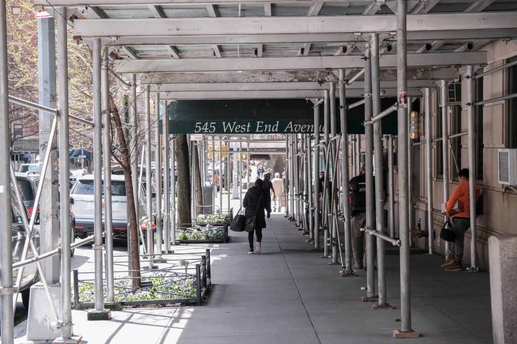 The view down West End Avenue: nearly two miles of scaffolding sheds on nearly every block 