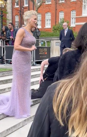 "Don’t be a dick otherwise I’ll move off. Don’t say ‘show me leg.’ No,” she continued. The "Mission Impossible" star, who was dressed in a floor-length purple gown, was later spotted continuing to exchange words with the photographer while shaking her head. 