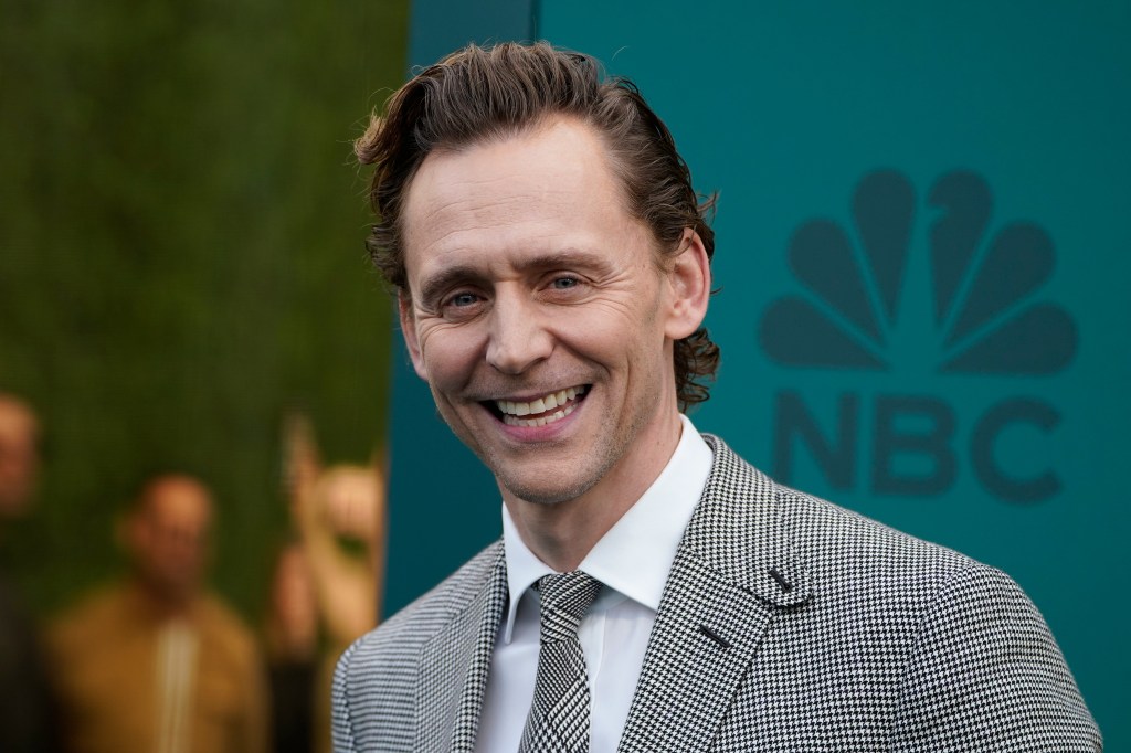 Tom Hiddleston arrives at the People's Choice Awards in Santa Monica on Feb. 18, 2024.