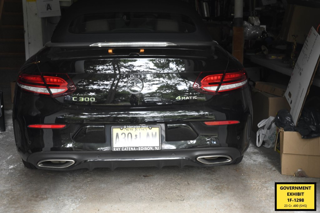 Mercedes convertible inside Menendez' garage.