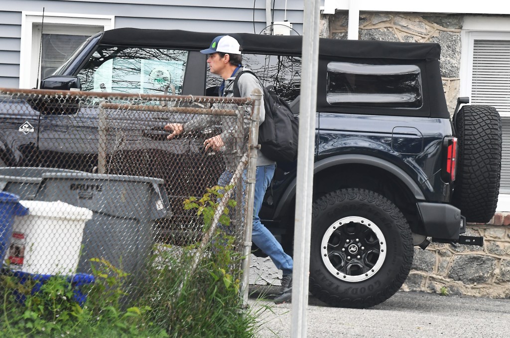 Marciano was dressed casually as he walked toward his vehicle.