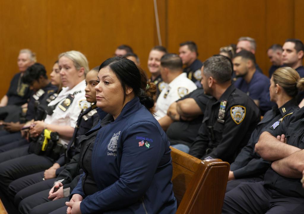 NYPD officers sitting in court to support the Diller family.