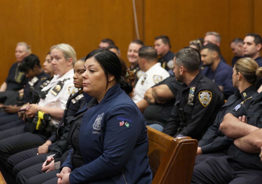 NYPD officers sitting in court to support the Diller family.