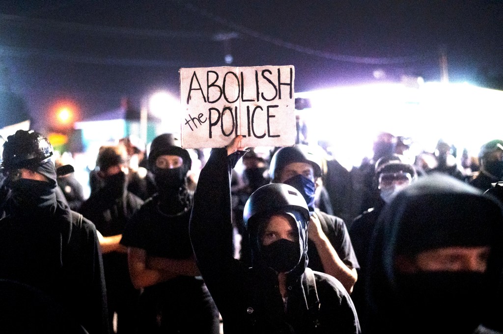 Anti-police protesters rally outside the Portland Police Association building on Friday, Sept. 4, 2020, in Portland, Oregon.