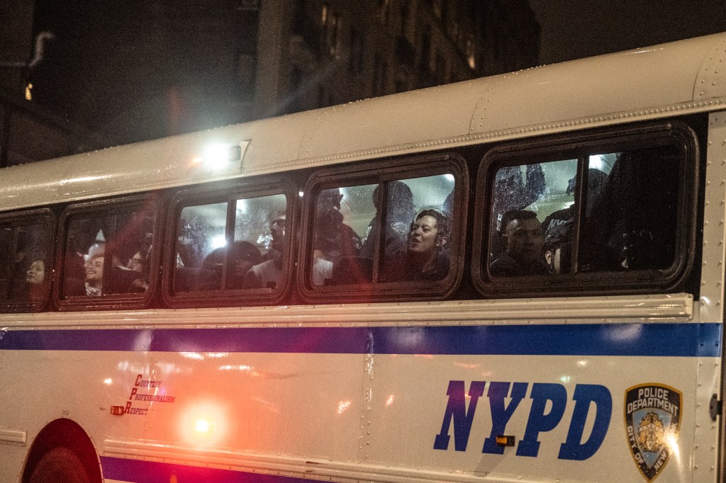 Dozens of detained protesters were seen being filed out to buses by NYPD officers from Columbia’s campus after police used zip ties to make multiple arrests. 