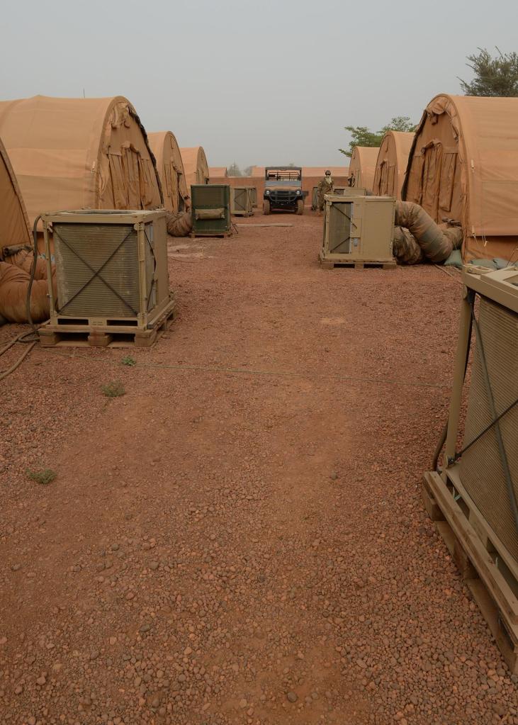 Heating and air conditioning units operating behind tents at Nigerien Air Base 101, housing Russian and US troops, on April 3, 2017