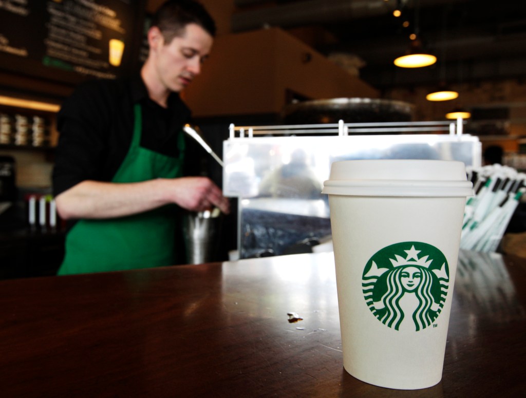 Starbucks employees say that the company has cut down on staff, leading to longer wait times for customers.