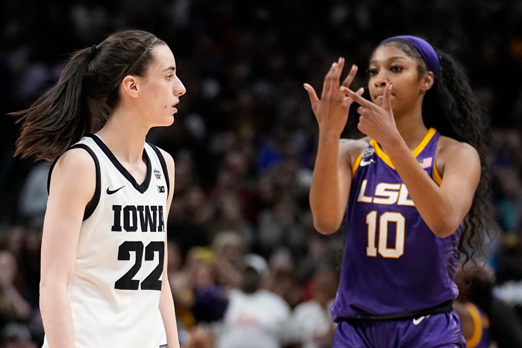 LSU's Angel Reese expressing emotion in a basketball game against Iowa's Caitlin Clark at the NCAA Women's Final Four championship, 2023