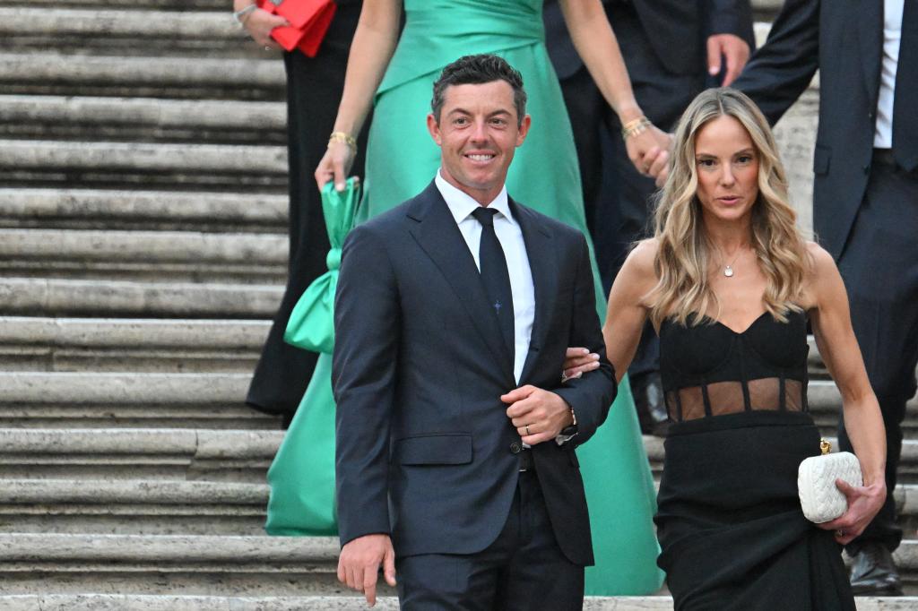 Rory McIlroy and wife Erica Stroll posing for a photo on the Spanish Steps in Rome before the Ryder Cup, shortly before filing for divorce