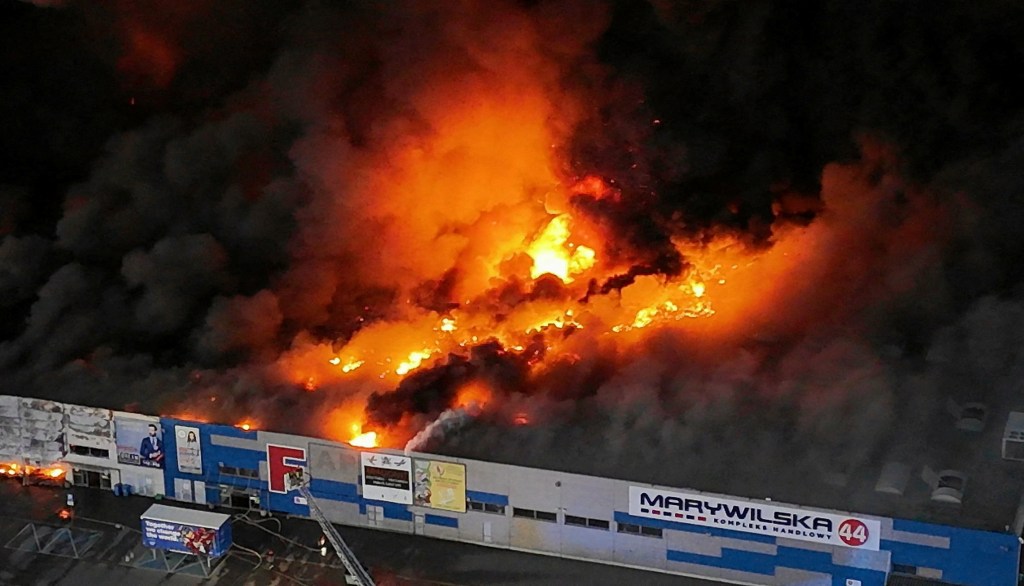 Drone view of the Marywilska 44 shopping centre burning during a massive fire in Warsaw, Poland