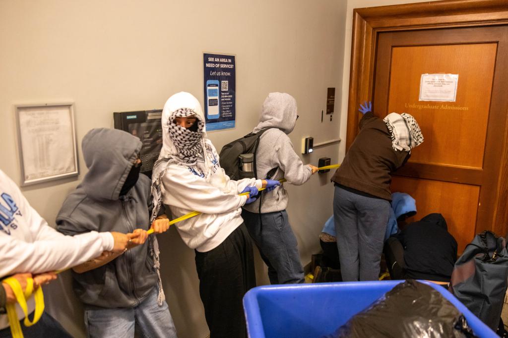 Protestors set up barricades and destroyed furniture during their occupation of the building.