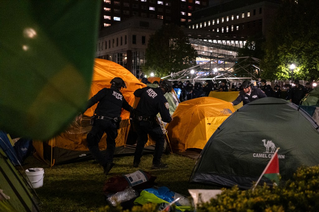 NYPD raids Columbia protests.