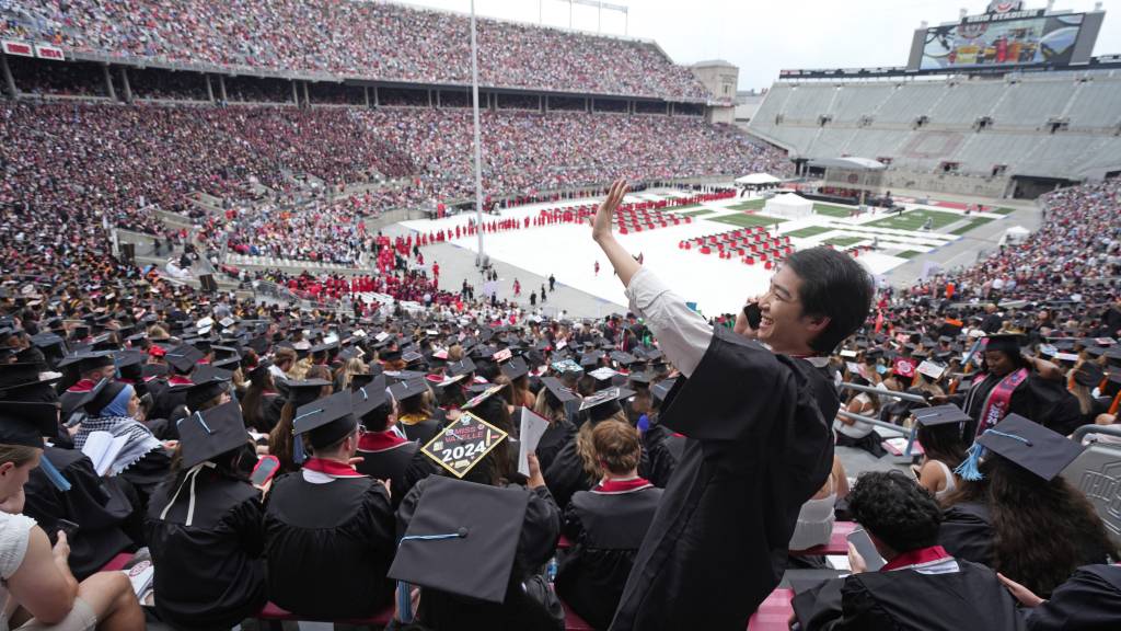 The school graduated more than 12,000 students on Sunday. 