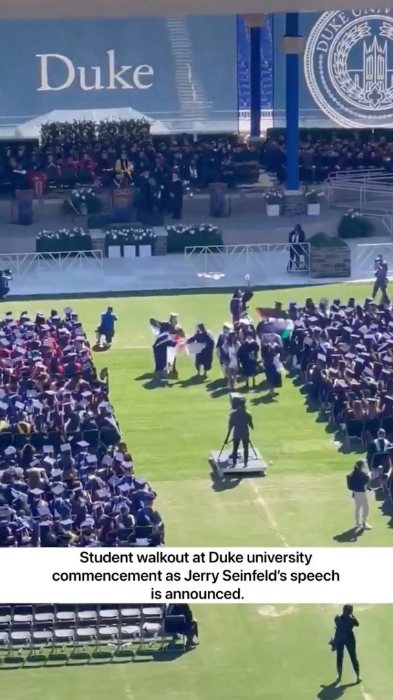 Video from the ceremony shows protesters carrying a Palestinian flag while leaving.