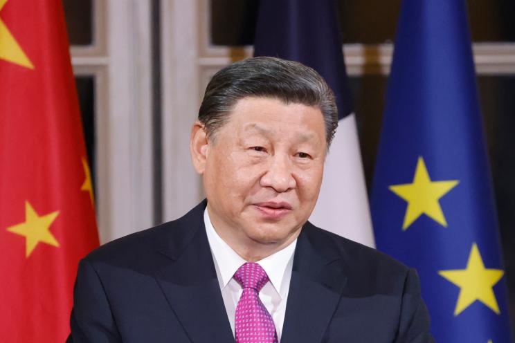 Chinese President Xi Jinping giving a toast at a state dinner at the Elysee Palace in Paris