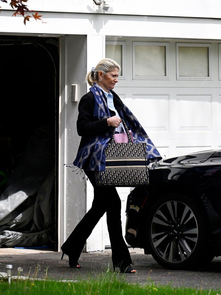 Nadine Menendez leaving their home.