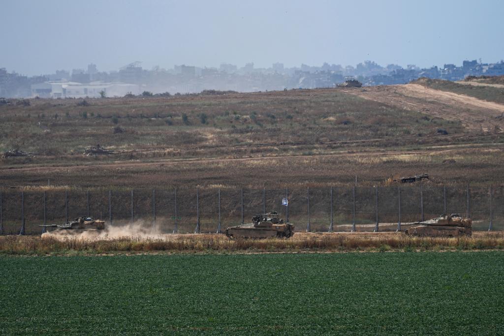 Israeli tanks moving toward the Gaza border on May 12, 2024.