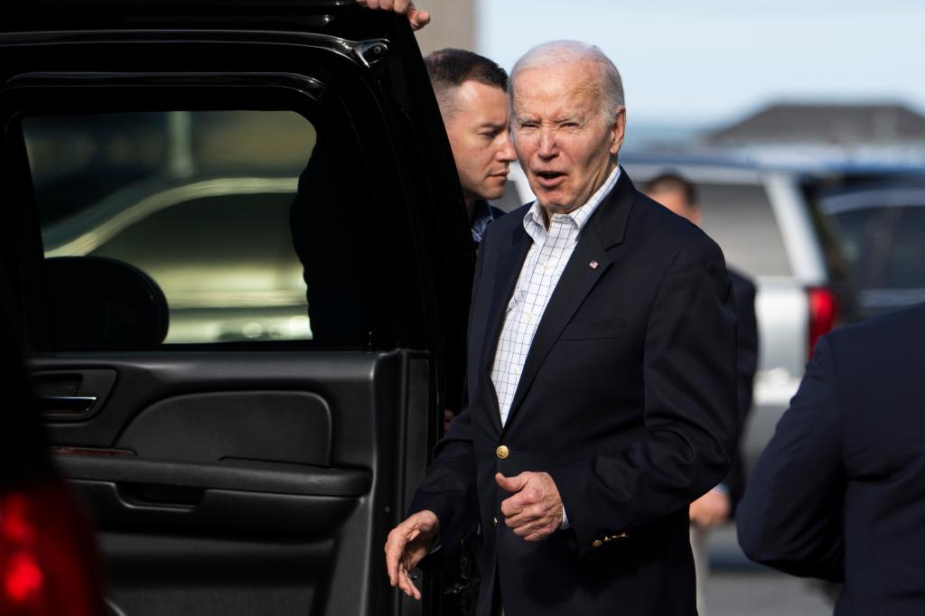 Joe Biden responds to reporters' questions in Rehoboth Beach, Del, on May 12, 2024.