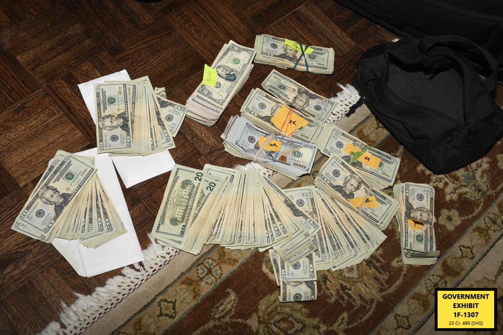 Cash strewn on the floor at Menendez' home