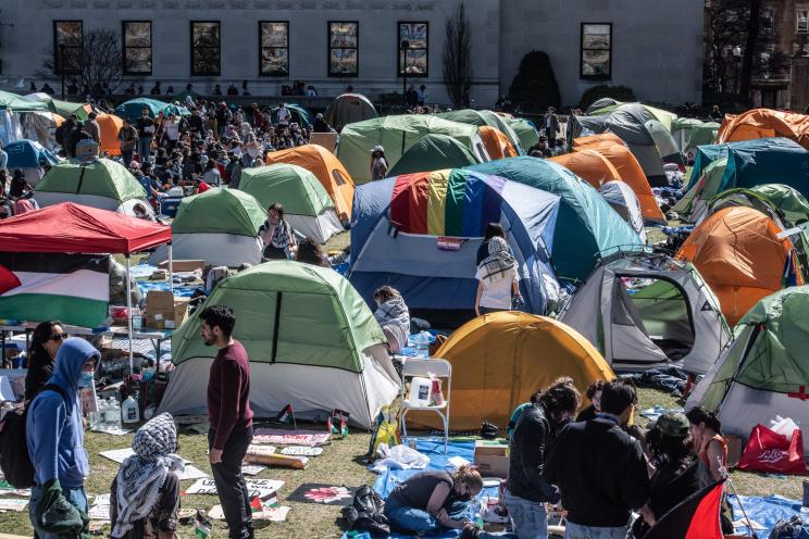 Columbia University students participate in an ongoing pro-Palestinian encampment on their campus following last week's arrest of more than 100 protesters on April 23, 2024 in New York City.