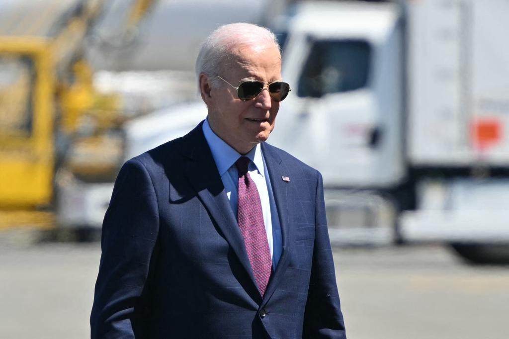 President Joe Biden makes his way to board Air Force One before departing from Seattle-Tacoma International Airport in Seatac, Washington, on May 11, 2024.