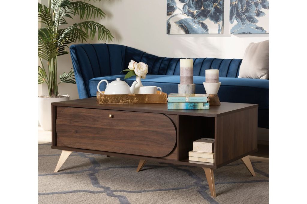 A living room with a couch and coffee table.