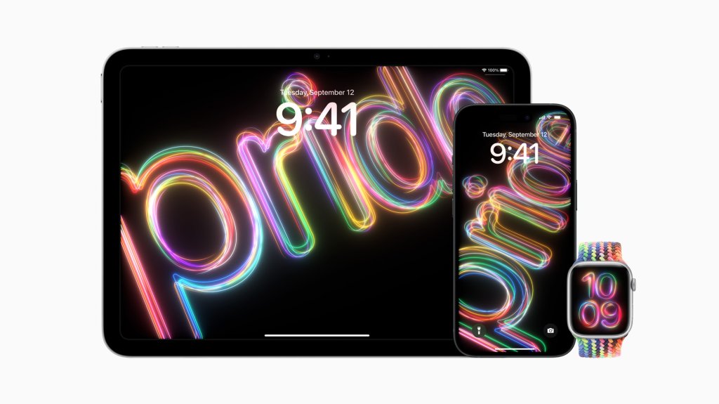 Apple's new Pride Edition Braided Solo Loop watch, with matching watch face, displayed next to iPad and iPhone featuring dynamic Pride wallpapers