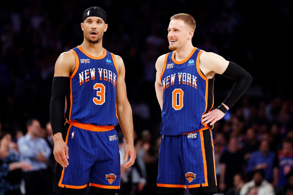 Donte DiVincenzo #0 talks with Josh Hart #3 of the New York Knicks during Game Five of the Eastern Conference Second Round Playoffs against the Indiana Pacers at Madison Square Garden on May 14, 2024 in New York City.