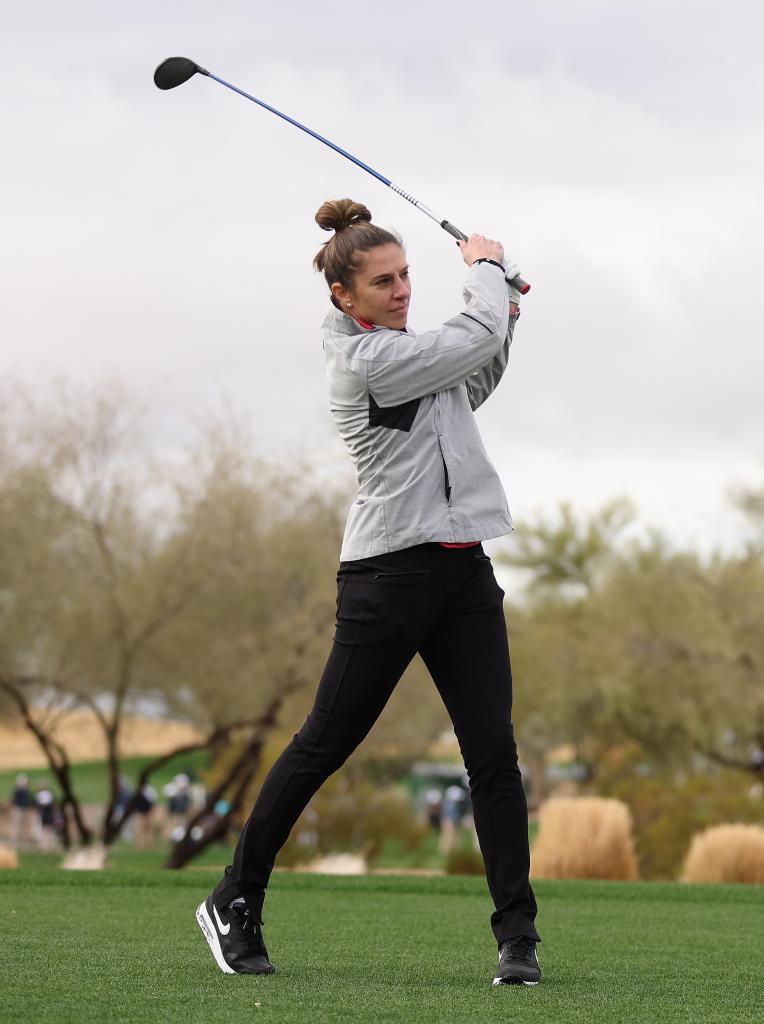 Carli Lloyd plays a tee shot on the first hole during the Pro-am to the WM Phoenix Open at TPC Scottsdale on February 7, 2024 in Scottsdale, Arizona.  