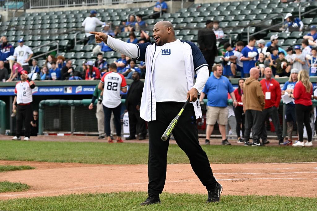 Giants' Dexter Lawrence reacts as he comes to bat in his celebrity softball game at Clover Stadium in Pomona, NY.