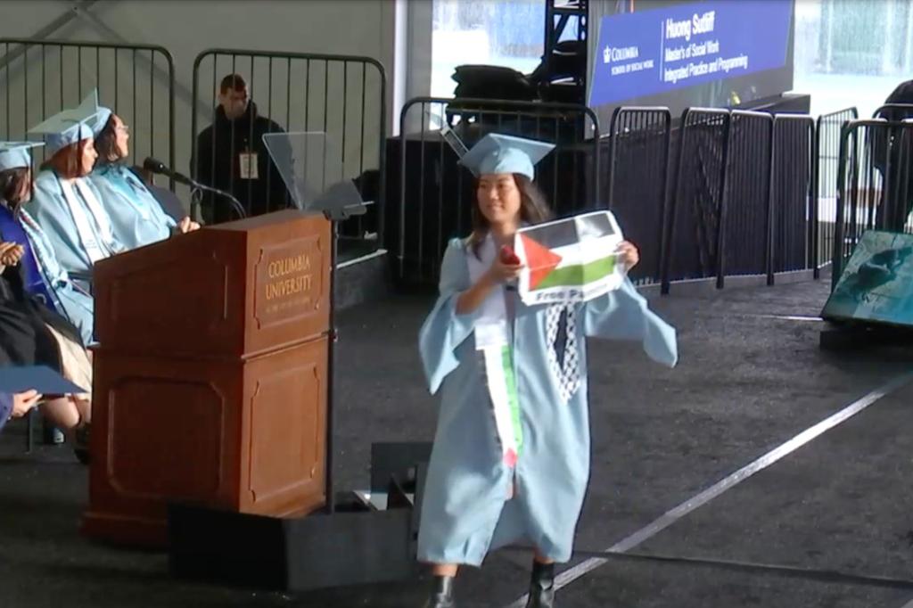 Huong Sutliff waved a Palestinian flag flyer as she accepted her degree. 