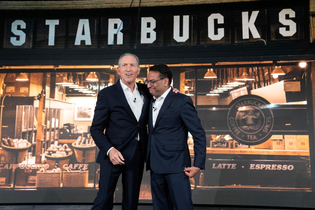 Former Starbucks CEO Howard Schultz (left) had some words of advice for his successor, Laxman Narasimhan (right). The two are seen above in September 2022.