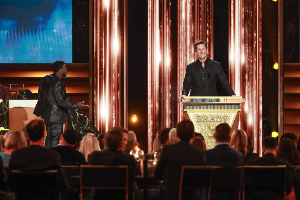 Kevin Hart and Tom Brady speak onstage during G.R.O.A.T The Greatest Roast Of All Time: Tom Brady for the Netflix is a Joke Festival at The Kia Forum on May 05, 2024 in Inglewood, California.

