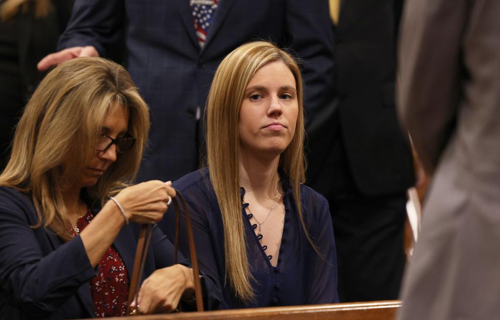 Showing on the right: killed NYPD Officer Jonathan Diller's wife Stephanie Diller in the courtroom, as Suspect Guy Rivera was Arraigned with Judge Aloise at Kew Garden Criminal Court at 125-01 Queens Blvd. in Queens, NY.