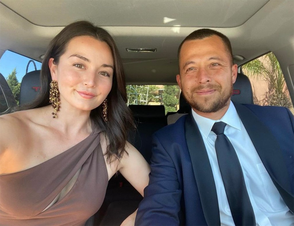 Xander Schauffele and  his wife Maya Lowe pose for photos at The Spanish Steps in Rome, Italy, for the 2023 Ryder Cup in September. 