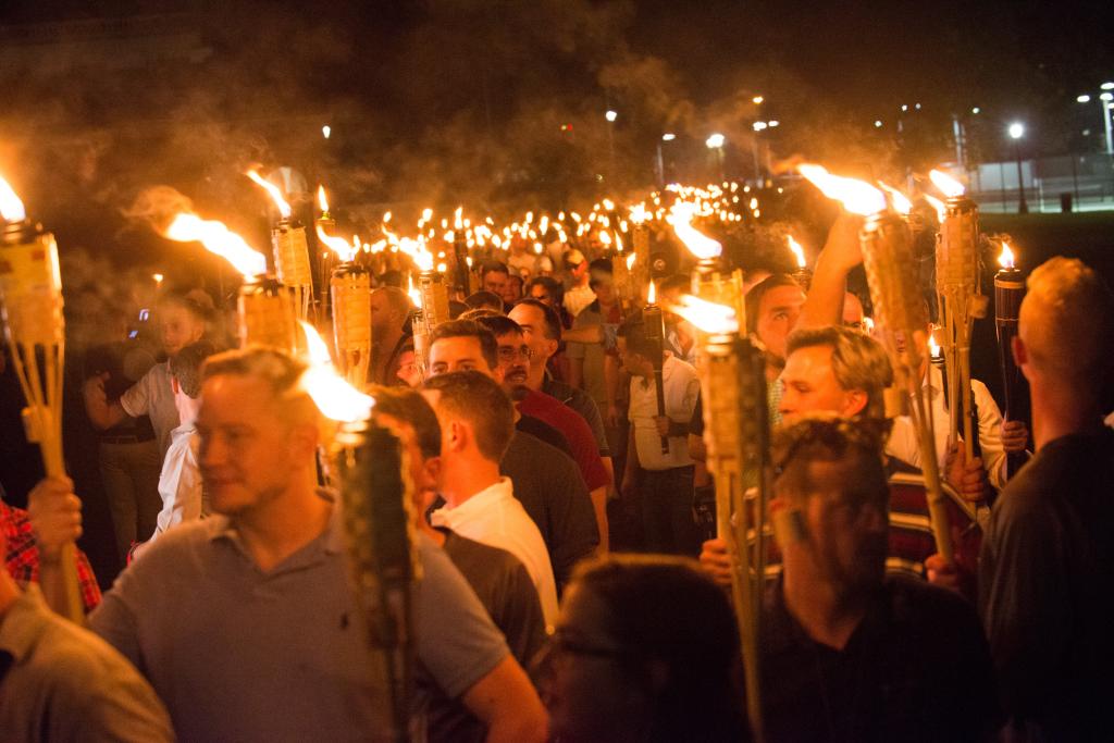 Neo-Nazis, Alt-Right, and White Supremacists holding tiki torches during a nighttime march on the University of Virginia campus, 2017