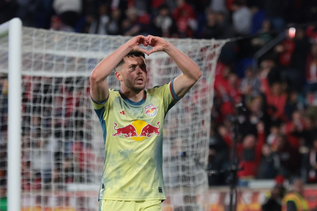 New York Red Bulls midfielder Lewis Morgan celebrating his goal against Vancouver Whitecaps FC by making a heart symbol with his hands