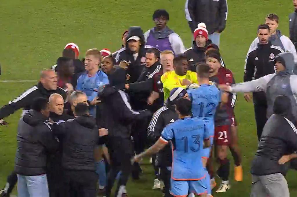 Sean Johnson, wearing a yellow jersey, and Strahinja Tanasijević (12) were at the center of the NYCFC-Toronto FC brawl Saturday.