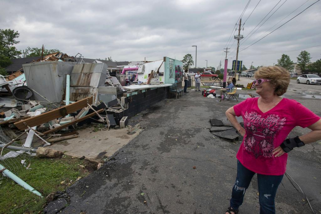 Pinkey Edmonson inspecting a destroyed hamburger stand in Rogers, Arkansas on May 26, 2024.