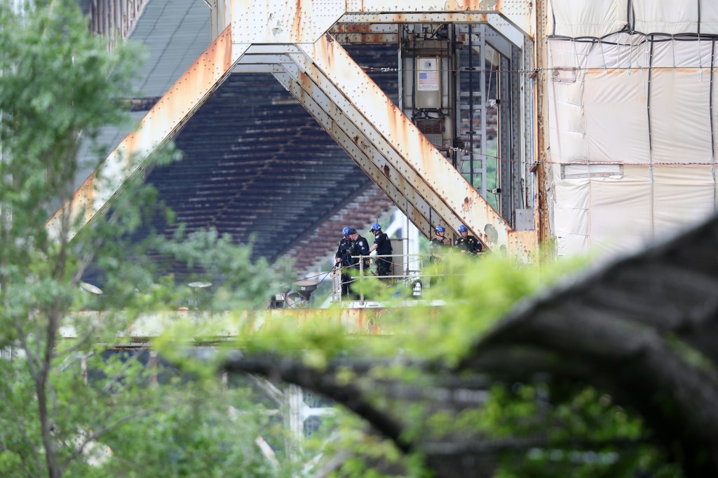 Photo of: The police trying to talk a person down from jumping off the GWB in Manhattan