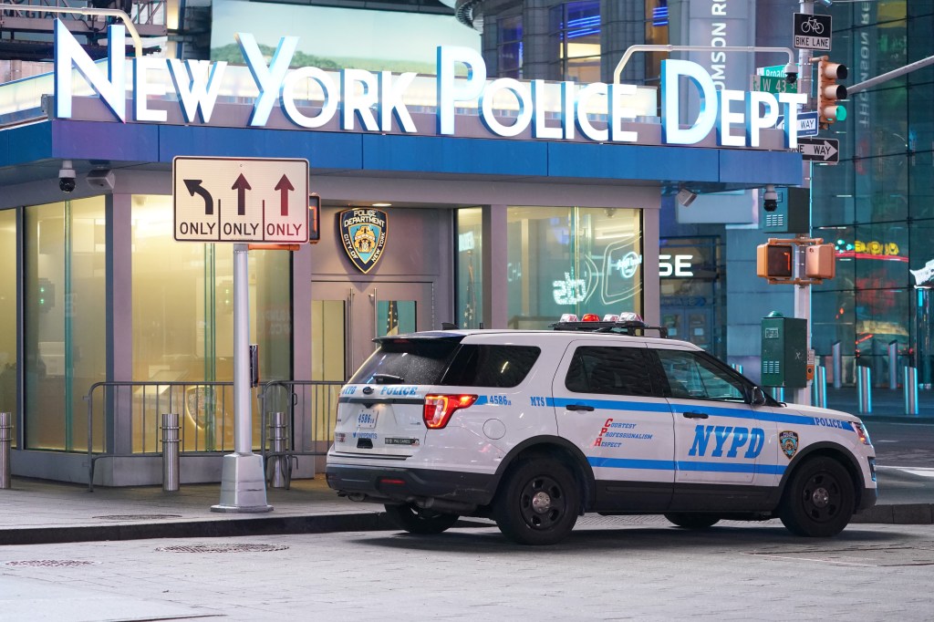 A police car parked in front of the NYPD Times Square sub-station in New York City on April 26, 2020.