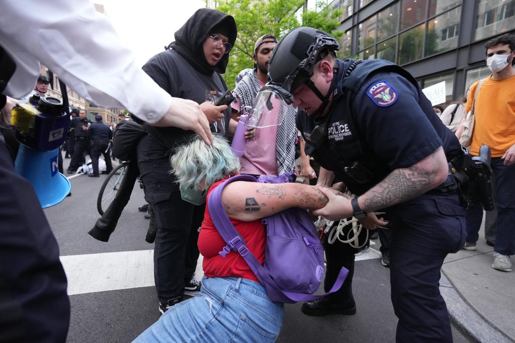 The arrested protesters were cuffed in the vicinity of Madison Ave and East 83rd Street after marching from CUNY’s Hunter College.