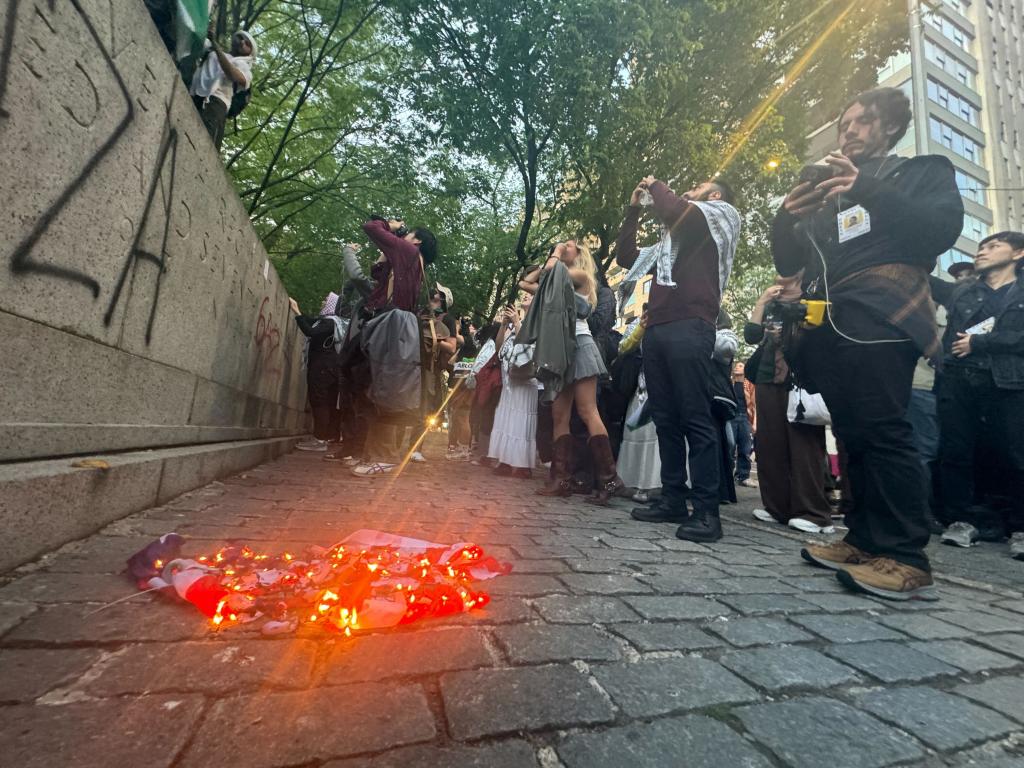 At least 27 people were cuffed as demonstrations near the star-studded Met Gala on the Upper East Side descended into chaos Monday evening.