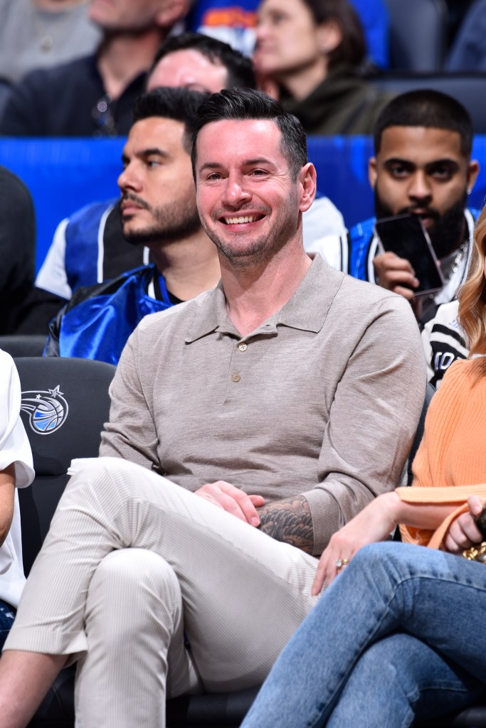 JJ Redick smiles during the Orlando Magic game against the New York Knicks on February 14, 2024 at the Kia Center in Orlando, Florida.