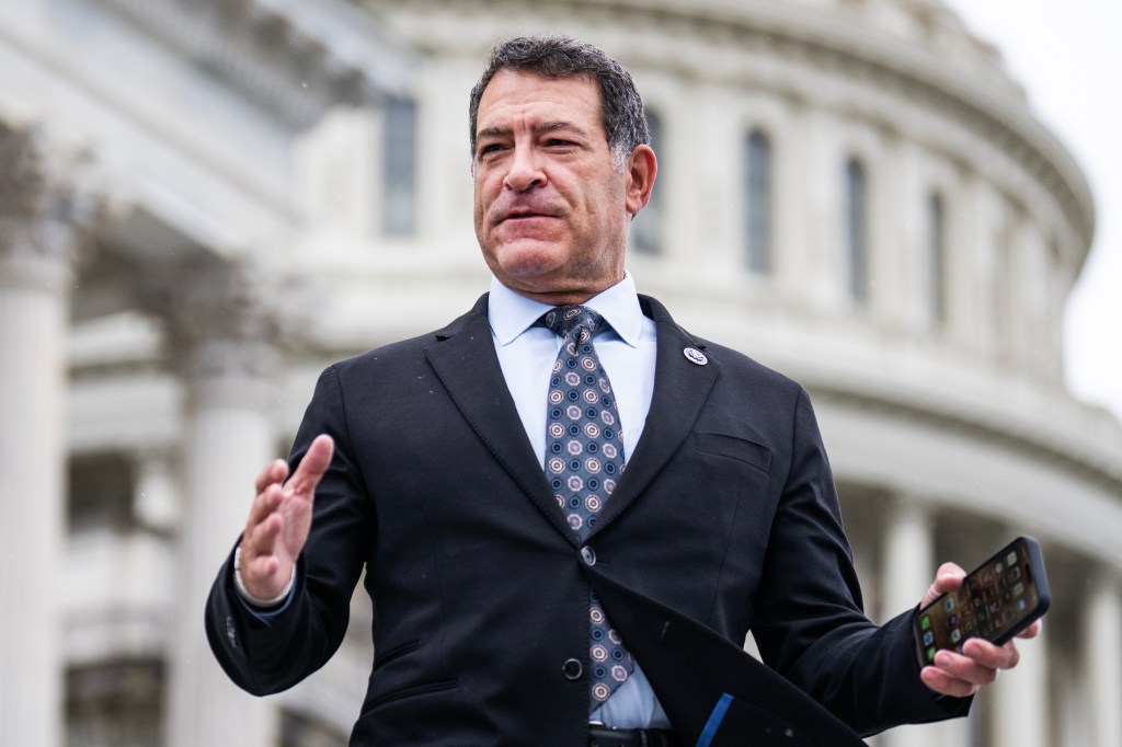 Rep. Mark Green, R-Tenn., is seen on the House steps of the U.S. Capitol during votes on Friday, April 12, 2024. 