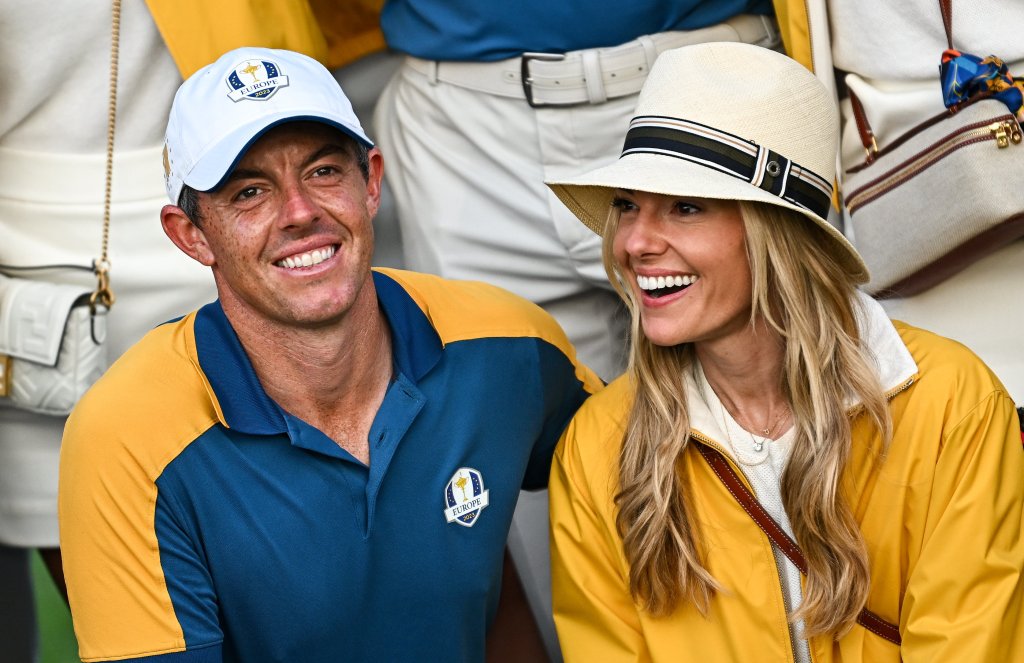 Rory McIlroy and his wife Erica McIlroy smiling after the singles matches at the 2023 Ryder Cup in Rome, Italy